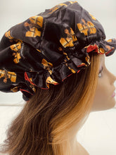 Load image into Gallery viewer, Black &amp; Red Reversible Yummybitestv Signature Bonnet